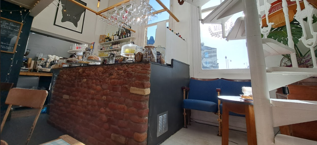 interior of sitting room cafe, showing the bar area